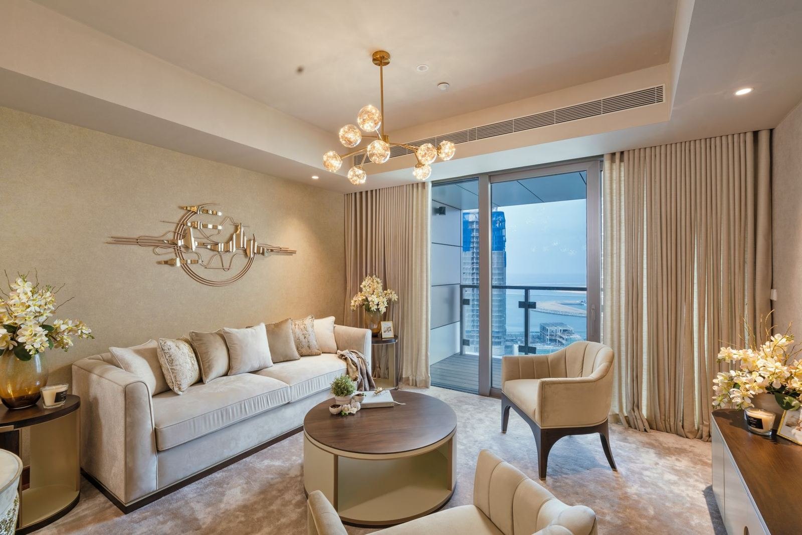 Living room in soft champagne and aubergine tones