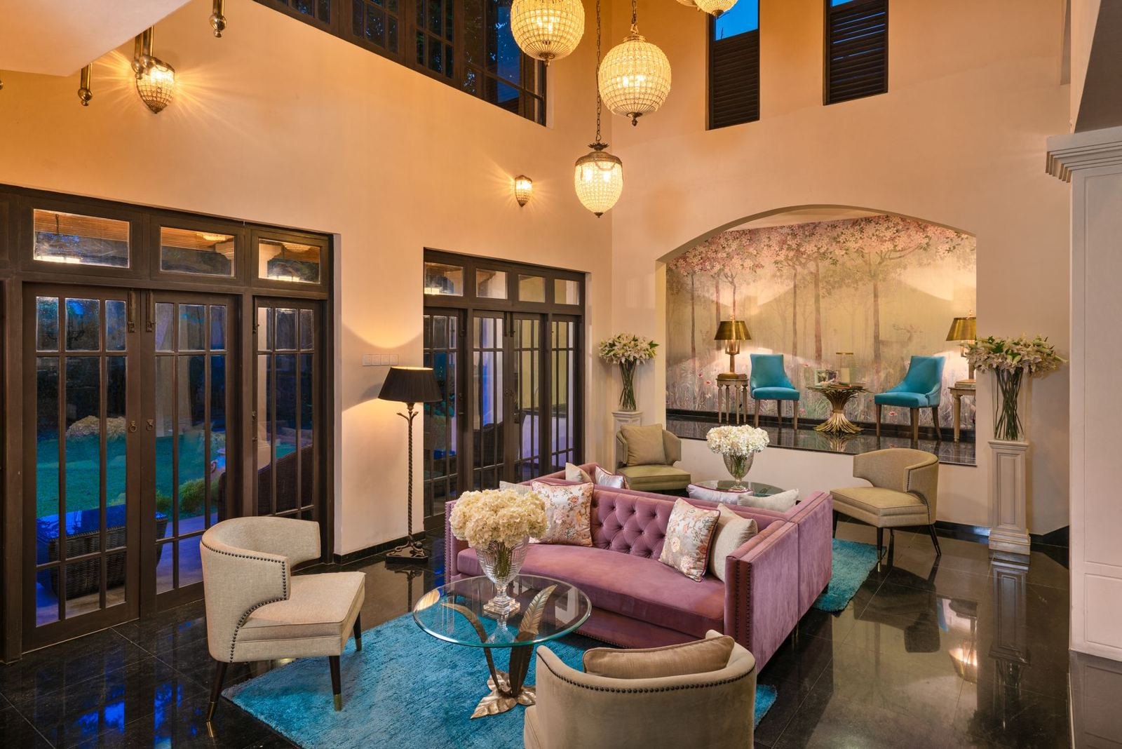 Double-height lobby with layered lanterns and timber screens